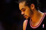 MIAMI, FL - APRIL 19:  Joakim Noah #13 of the Chicago Bulls looks on during a game against the Miami Heat at American Airlines Arena on April 19, 2012 in Miami, Florida. NOTE TO USER: User expressly acknowledges and agrees that, by downloading and/or using this Photograph, User is consenting to the terms and conditions of the Getty Images License Agreement.  (Photo by Mike Ehrmann/Getty Images)