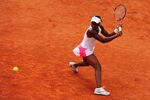 PARIS, FRANCE - JUNE 01:  Sloane Stephens of USA plays a backhand during her women's singles third round match against Mathilde Johansson of France during day six of the French Open at Roland Garros on June 1, 2012 in Paris, France.  (Photo by Mike Hewitt/Getty Images)