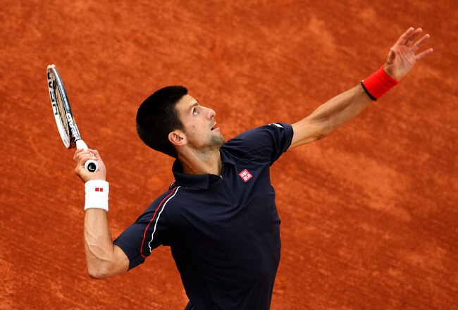 PARIS, FRANCE - JUNE 01:  Novak Djokovic of Serbia serves during his men's singles third round match against Nicolas Devilder of France during day six of the French Open at Roland Garros on June 1, 2012 in Paris, France.  (Photo by Matthew Stockman/Getty Images)