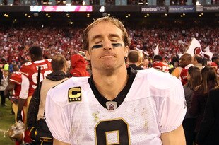 SAN FRANCISCO, CA - JANUARY 14:  Drew Brees #9 of the New Orleans Saints reacts after they lost their game against the the San Francisco 49ers in the NFC Divisional playoff game at Candlestick Park on January 14, 2012 in San Francisco, California.  (Photo by Ezra Shaw/Getty Images)