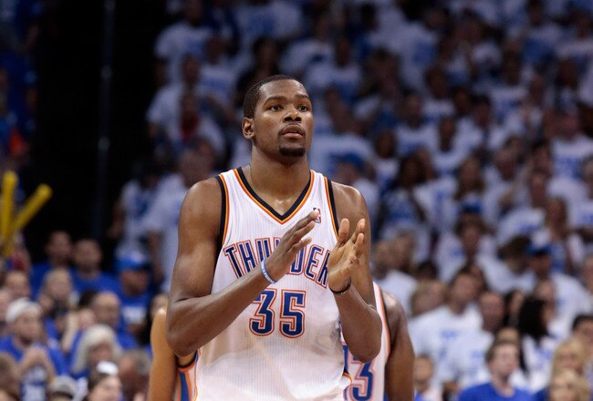 OKLAHOMA CITY, OK - JUNE 02:  Kevin Durant #35 of the Oklahoma City Thunder reacts in the fourth quarter while taking on the San Antonio Spurs in Game Four of the Western Conference Finals of the 2012 NBA Playoffs at Chesapeake Energy Arena on June 2, 2012 in Oklahoma City, Oklahoma. NOTE TO USER: User expressly acknowledges and agrees that, by downloading and or using this photograph, User is consenting to the terms and conditions of the Getty Images License Agreement.  (Photo by Brett Deering/Getty Images)
