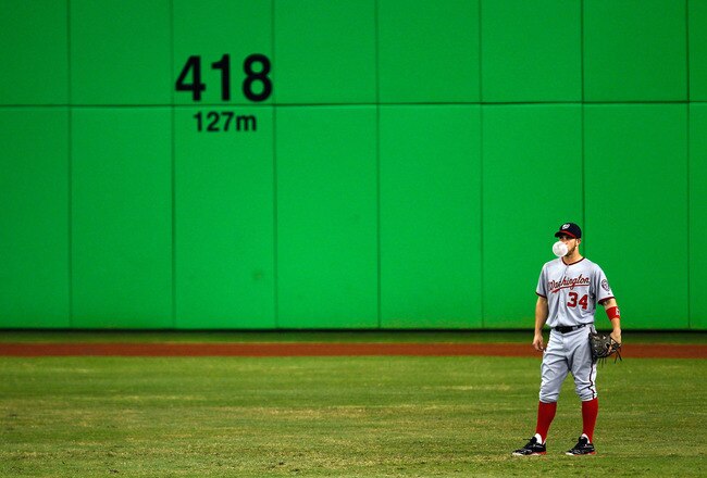 MIAMI, FL - MAY 30: Bryce Harper #34 of the Washington Nationals looks on from center field during a game against the Miami Marlins at Marlins Park on May 30, 2012 in Miami, Florida. The Marlins defeated the Nationals 5-3. (Photo by Sarah Glenn/Getty Images)