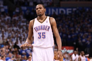 OKLAHOMA CITY, OK - JUNE 02:  Kevin Durant #35 of the Oklahoma City Thunder reacts in the fourth quarter while taking on the San Antonio Spurs in Game Four of the Western Conference Finals of the 2012 NBA Playoffs at Chesapeake Energy Arena on June 2, 2012 in Oklahoma City, Oklahoma. NOTE TO USER: User expressly acknowledges and agrees that, by downloading and or using this photograph, User is consenting to the terms and conditions of the Getty Images License Agreement.  (Photo by Ronald Martinez/Getty Images)