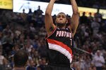 DALLAS, TX - APRIL 25:  Guard Brandon Roy #7 of the Portland Trail Blazers takes a shot against Tyson Chandler #6 of the Dallas Mavericks in Game Five of the Western Conference Quarterfinals during the 2011 NBA Playoffs on April 25, 2011 at American Airlines Center in Dallas, Texas.  NOTE TO USER: User expressly acknowledges and agrees that, by downloading and or using this photograph, User is consenting to the terms and conditions of the Getty Images License Agreement.  (Photo by Ronald Martinez/Getty Images)