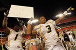 MIAMI GARDENS, FL - JANUARY 04:  (L-R) Tavon Austin #1 and Stedman Bailey #3 of the West Virginia Mountaineers hold up a sign which reads '83%' wrong after they won 70-33 against the Clemson Tigers during the Discover Orange Bowl at Sun Life Stadium on January 4, 2012 in Miami Gardens, Florida.  (Photo by Streeter Lecka/Getty Images)