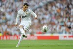 MADRID, SPAIN - MAY 13:  Cristiano Ronaldo of Real Madrid CF passes the ball during the La Liga match between Real Madrid CF and RCD Mallorca at Estadio Santiago Bernabeu on May 13, 2012 in Madrid, Spain.  (Photo by Denis Doyle/Getty Images)