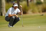 AVONDALE, LA - APRIL 27:  Bubba Watson lines up a putt on the 14th hole during the second round of the Zurich Classic at TPC Louisiana on April 27, 2012 in Avondale, Louisiana.  (Photo by Chris Graythen/Getty Images)
