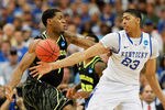 ATLANTA, GA - MARCH 25:  Anthony Davis #23 of the Kentucky Wildcats and Perry Jones III #1 of the Baylor Bears vie for posession during the 2012 NCAA Men's Basketball South Regional Final at the Georgia Dome on March 25, 2012 in Atlanta, Georgia.  (Photo by Streeter Lecka/Getty Images)