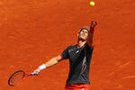 PARIS, FRANCE - JUNE 02:  Andy Murray of Great Britain serves during his men's singles third round match against Santiago Giraldo of Colombia during day seven of the French Open at Roland Garros on June 2, 2012 in Paris, France.  (Photo by Matthew Stockman/Getty Images)