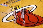 MIAMI, FL - MAY 30:  LeBron James #6 and Dwyane Wade #3 of the Miami Heat looks on in the second half against the Boston Celtics in Game Two of the Eastern Conference Finals in the 2012 NBA Playoffs on May 30, 2012 at American Airlines Arena in Miami, Florida. NOTE TO USER: User expressly acknowledges and agrees that, by downloading and or using this photograph, User is consenting to the terms and conditions of the Getty Images License Agreement.  (Photo by J. Meric/Getty Images)