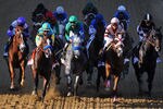 BALTIMORE, MD - MAY 19:  The field heads into the first turn during the 137th Preakness Stakes at Pimlico Race Course on May 19, 2012 in Baltimore, Maryland.  (Photo by Rob Carr/Getty Images)