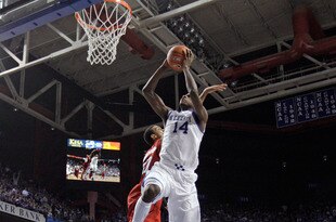 LEXINGTON, KY - DECEMBER 31:  Michael Kidd-Gilchrist #14 of the Kentucky Wildcats dunks the ball during the 69-62 win over the Louisville Cardinals at Rupp Arena on December 31, 2011 in Lexington, Kentucky.  (Photo by Andy Lyons/Getty Images)