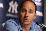 NEW YORK, NY - JULY 08:  General manager Brian Cashman of the New York Yankees speaks to the media after the game against the Tampa Bay Rays was postponed due to rain on July 8, 2011 at Yankee Stadium in the Bronx borough of New York City.  (Photo by Jim McIsaac/Getty Images)
