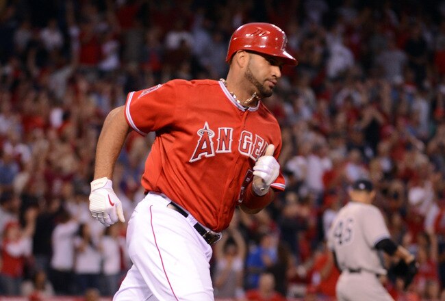 ANAHEIM, CA - MAY 29:  Albert Pujols #5 of the Los Angeles Angels runs to first after his 2 run homerun in front of Andy Pettitte #46 of the New York Yankees for a 3-0 lead duing the third inning at Angel Stadium of Anaheim on May 29, 2012 in Anaheim, California.  (Photo by Harry How/Getty Images)