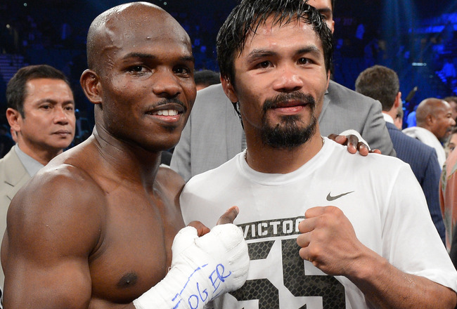 LAS VEGAS, NV - JUNE 09:  (L-R) Timothy Bradley and Manny Pacquiao pose for a photo after Bradley defeated Pacquiao by split decision to win the WBO welterweight championship at MGM Grand Garden Arena on June 9, 2012 in Las Vegas, Nevada.  (Photo by Kevork Djansezian/Getty Images)