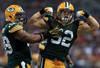 ST LOUIS, MO - OCTOBER 21:  Outside linebacker Clay Matthews #52 of the Green Bay Packers celebrates his sack of quarterback Sam Bradford #8 of the St. Louis Rams with defensive end Jerel Worthy #99 of the Green Bay Packers in the third quarter at Edward Jones Dome on October 21, 2012 in St Louis, Missouri. The Packers defeated the Rams 30-20.  (Photo by Doug Pensinger/Getty Images)