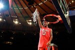 NEW YORK, NY - MARCH 10:  Peyton Siva #3 of the Louisville Cardinals holds up the net after cutting it down after defeating the Cincinnati Bearcats during the finals of the Big East Men's Basketball Tournament at Madison Square Garden at Madison Square Garden on March 10, 2012 in New York City.  (Photo by Chris Trotman/Getty Images)