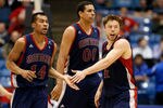 DAYTON, OH - MARCH 19:  (L-R) Stephen Holt #14, Brad Waldow #00 and Matthew Dellavedova #4 of the St. Mary's Gaels react after a play in the second half against the Middle Tennessee Blue Raiders during the first round of the 2013 NCAA Men's Basketball Tournament at University of Dayton Arena on March 19, 2013 in Dayton, Ohio.  (Photo by Gregory Shamus/Getty Images)