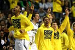 AUBURN HILLS, MI - MARCH 23:  Players for the Michigan Wolverines react on the bench in the second half against the Virginia Commonwealth Rams during the third round of the 2013 NCAA Men's Basketball Tournament at The Palace of Auburn Hills on March 23, 2013 in Auburn Hills, Michigan.  (Photo by Jonathan Daniel/Getty Images)