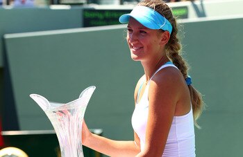 KEY BISCAYNE, FL - APRIL 02:  Victoria Azarenka of Belarus celebrates with the trophy after she won her match against Maria Sharapova of Russia during the women's singles championship at the Sony Ericsson Open at Crandon Park Tennis Center on April 2, 201