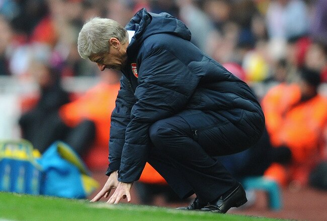 LONDON, ENGLAND - NOVEMBER 20:  Arsenal manager Arsene Wenger reacts to Tottenham's winning goal during the Barclays Premier League match between Arsenal and Tottenham Hotspur at the Emirates Stadium on November 20, 2010 in London, England.  (Photo by Mik