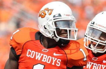 STILLWATER, OK - SEPTEMBER 5:  Wide receiver Dez Bryant #1 of the Oklahoma State Cowboys celebrates his touchdown with teammate Dexter Pratt #22 during the second quarter of the game against the Georgia Bulldogs at Boone Pickens Stadium on September 5, 20