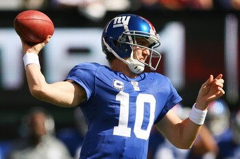 EAST RUTHERFORD, NJ - OCTOBER 17:  Eli Manning of the New York Giants drops back to pass against the Detroit Lions at New Meadowlands Stadium on October 17, 2010 in East Rutherford, New Jersey.  (Photo by Andrew Burton/Getty Images)