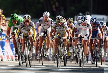 BESANCON, FRANCE - JULY 18:  Mark Cavendish of Great Britain and Columbia-HTC battles with Thor Hushovd (L) of Norway and the Cervelo Test Team to win the bunch sprint on stage 14 of the 2009 Tour de France from Colmar to Besancon on July 18, 2009 in Besa