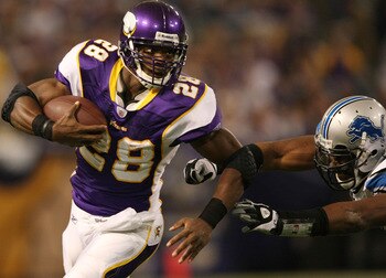 MINNEAPOLIS - NOVEMBER 15:  Adrian Peterson #28 of the Minnesota Vikings carries the ball as Julian Peterson #59 of the Detroit Lions defends on November 15, 2009 at Hubert H. Humphrey Metrodome in Minneapolis, Minnesota.  (Photo by Elsa/Getty Images)