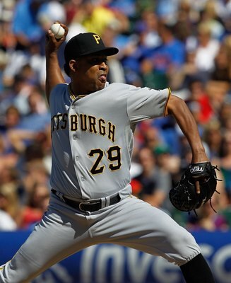 CHICAGO - JUNE 30: Octavio Dotel #29 of the Pittsburgh Pirates pitches in the 9th inning on his way to a save against the Chicago Cubs at Wrigley Field on June 30, 2010 in Chicago, Illinois. The Pirates defeated the Cubs 2-0. (Photo by Jonathan Daniel/Get