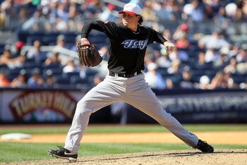 NEW YORK - JULY 04:  Scott Downs #37 of the Toronto Blue Jays delivers a pitch against the New York Yankees on July 4, 2010 at Yankee Stadium in the Bronx borough of New York City.  (Photo by Jim McIsaac/Getty Images)