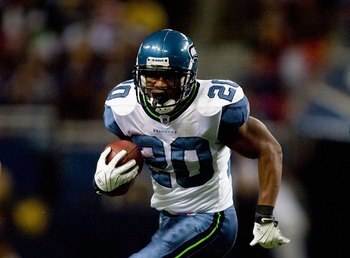 ST. LOUIS - NOVEMBER 29:  Justin Forsett #20 of the Seattle Seahawks runs with the ball for yardage against the St. Louis Rams during their NFL game at Edward Jones Dome on November 29, 2009 in St. Louis, Missouri. The Seahawks defeated the Rams 27-17.  (