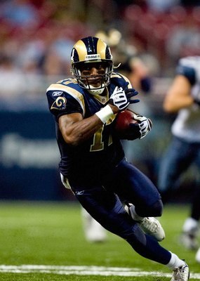 ST. LOUIS - NOVEMBER 29:  Donnie Avery #17 of the St. Louis Rams runs with the ball for yardage against the Seattle Seahawks during their NFL game at Edward Jones Dome on November 29, 2009 in St. Louis, Missouri. The Seahawks defeated the Rams 27-17.  (Ph