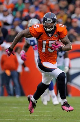DENVER - OCTOBER 04:  Brandon Marshall #15 of the Denver Broncos makes a reception against the Dallas Cowboys during NFL action at Invesco Field at Mile High on October 4, 2009 in Denver, Colorado. The Broncos defeated the Cowboys 17-10.  (Photo by Doug P