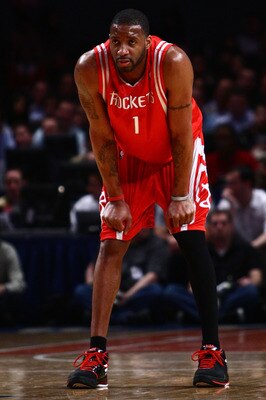 NEW YORK - JANUARY 26:  Tracy McGrady #1 of the Houston Rockets watches on against the New York Knicks at Madison Square Garden January 26, 2009 in New York City. NOTE TO USER: User expressly acknowledges and agrees that, by downloading and/or using this