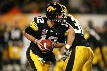 MIAMI GARDENS, FL - JANUARY 05:  Quarterback Richy Stanzi #12 of the Iowa Hawkeyes turns to hand the ball off against the Georgia Tech Yellow Jackets during the FedEx Orange Bowl at Land Shark Stadium on January 5, 2010 in Miami Gardens, Florida. Iowa won