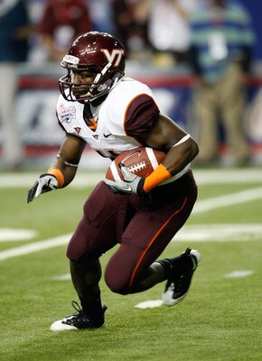 ATLANTA - DECEMBER 31:  Running back David Wilson #4 of the Virginia Tech Hokies runs with the ball during the Chick-Fil-A Bowl against the Tennessee Volunteers at the Georgia Dome on December 31, 2009 in Atlanta, Georgia.  The Hokies beat the Volunteers 