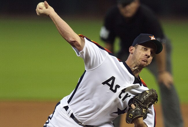 HOUSTON - JULY 24:  Pitcher Roy Oswalt #44 of the Houston Astros throws against the Cincinnati Reds in the first inning at Minute Maid Park on July 24, 2010 in Houston, Texas.  (Photo by Bob Levey/Getty Images)