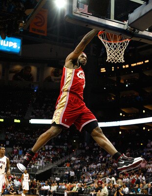 ATLANTA - MAY 11:  LeBron James #23 of the Cleveland Cavaliers dunks against the Atlanta Hawks during Game Four of the Eastern Conference Semifinals during the 2009 NBA Playoffs at Philips Arena on May 11, 2009 in Atlanta, Georgia.  NOTE TO USER: User exp
