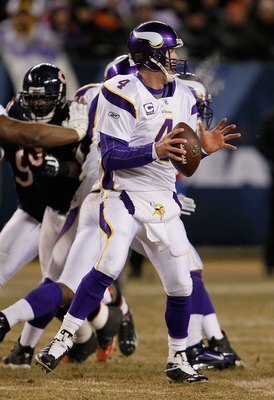 CHICAGO - DECEMBER 28: Brett Favre #4 of the Minnesota Vikings looks for a receiver against the Chicago Bears at Soldier Field on December 28, 2009 in Chicago, Illinois. The Bears defeated the Vikings 36-30 in overtime. (Photo by Jonathan Daniel/Getty Ima