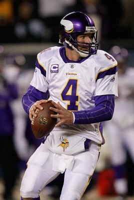 CHICAGO - DECEMBER 28: Brett Favre #4 of the Minnesota Vikings looks for a receiver against the Chicago Bears at Soldier Field on December 28, 2009 in Chicago, Illinois. The Bears defeated the Vikings 36-30 in overtime. (Photo by Jonathan Daniel/Getty Ima
