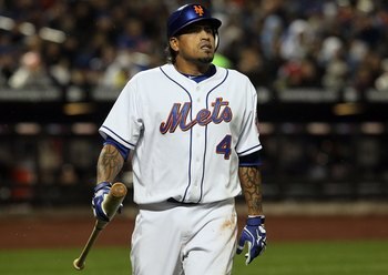 NEW YORK - APRIL 25:  Henry Blanco #4 of the New York Mets looks on against the Atlanta Braves on April 25, 2010 at Citi Field in the Flushing neighborhood of the Queens borough of New York City.  (Photo by Jim McIsaac/Getty Images)