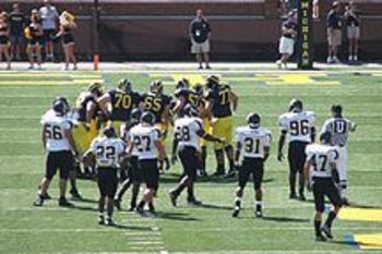 Michigan_appalachian_state_huddle_display_image