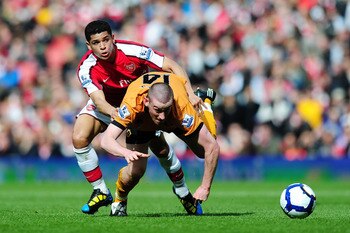 LONDON, ENGLAND - APRIL 03:  Denilson of Arsenal is challenged by David Jones of Wolverhampton Wanderers during the Barclays Premier League match between Arsenal and Wolverhampton Wanderers at the Emirates Stadium on April 3, 2010 in London, England.  (Ph