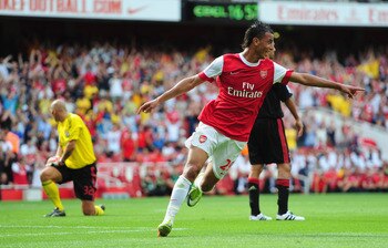 LONDON, ENGLAND - JULY 31:  Marouane Chamakh of Arsenal celebrates after scoring during the Emirates Cup match between Arsenal and AC Milan at Emirates Stadium on July 31, 2010 in London, England.  (Photo by Mike Hewitt/Getty Images)
