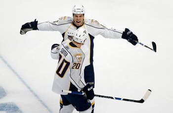 CHICAGO - OCTOBER 13:  Shea Weber #6 and Ryan Suter #20 of the Nashville Predators celebrate Weber's goal during the first period against the Chicago Blackhawks at the United Center on October 13, 2008 in Chicago, Illinois.  (Photo by Brian Kersey/Getty I
