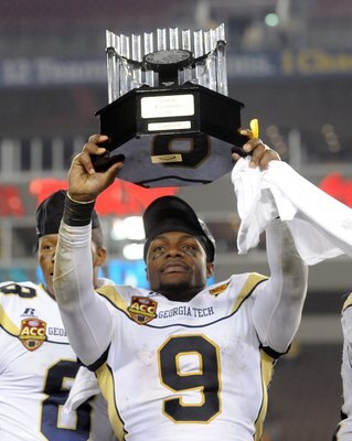 TAMPA, FL - NOVEMBER 28: Quarterback Josh Nesbitt #9 of the Georgia Tech Yellow Jackets celebrates a victory against the Clemson Tigers in the 2009 ACC Football Championship Game December 5, 2009 at Raymond James Stadium in Tampa, Florida.  (Photo by Al M
