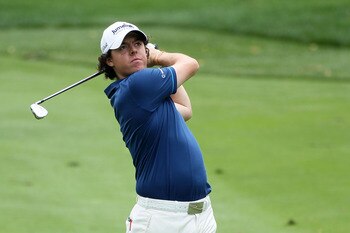 AKRON, OH - AUGUST 06:  Rory McIlroy of Northern Ireland plays an approach shot on the third hole during the second round of the World Golf Championships - Bridgestone Invitational on the South Course at Firestone Country Club on August 6, 2010 in Akron,