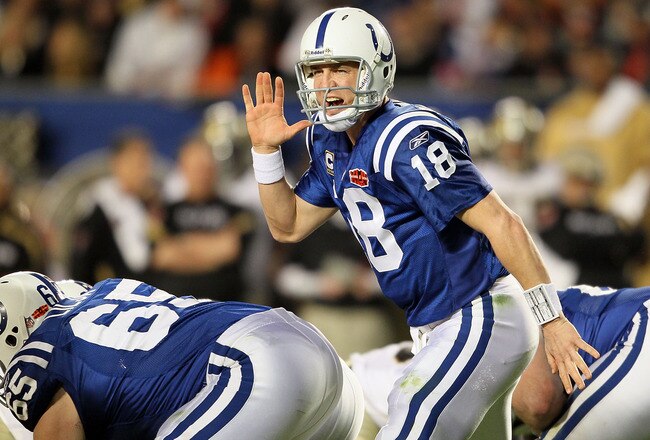 MIAMI GARDENS, FL - FEBRUARY 07: Peyton Manning #18 of the Indianapolis Colts signals under center against the New Orleans Saints during Super Bowl XLIV on February 7, 2010 at Sun Life Stadium in Miami Gardens, Florida.  (Photo by Andy Lyons/Getty Images)