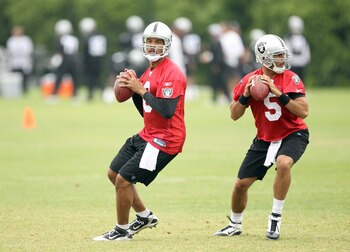 NAPA, CA - AUGUST 01:  Jason Campbell #8 and Bruce Gradkowski #5 of the Oakland Raiders work out during the Raiders training camp at their Napa Valley Training Complex on August 1, 2010 in Napa, California.  (Photo by Ezra Shaw/Getty Images)